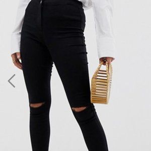 Black jeggings with knee rips